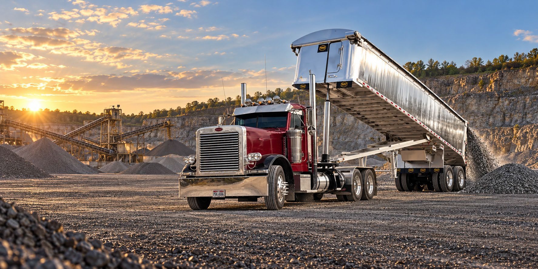MAC aluminium dump trailer unloading at a quarry